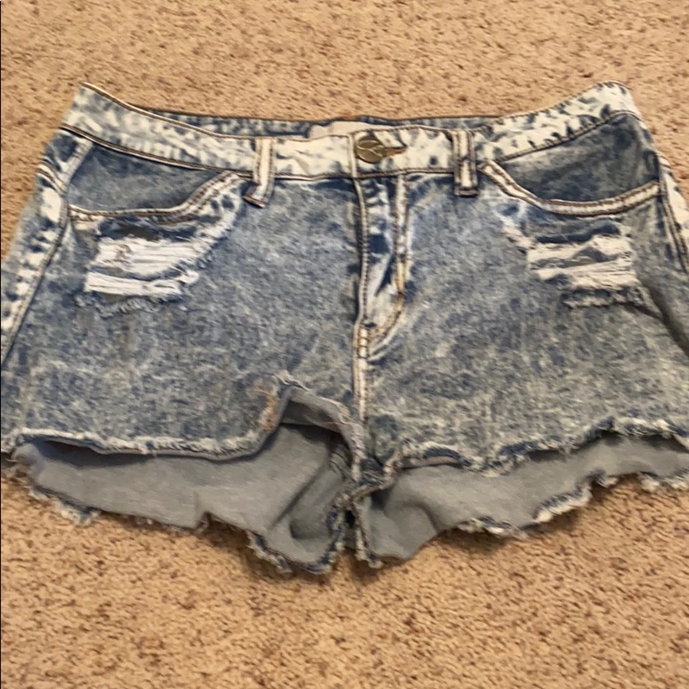 Highly distressed jean shorts